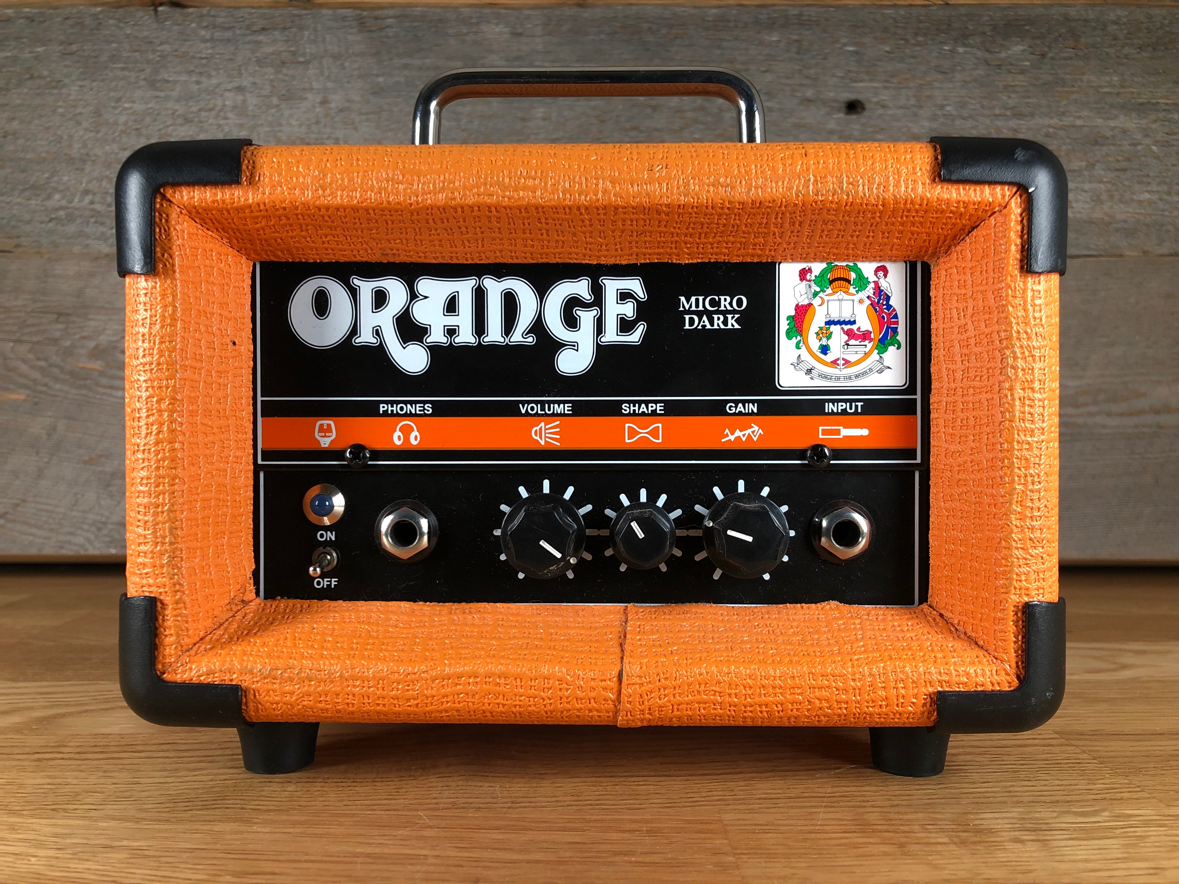 Orange micro store dark head